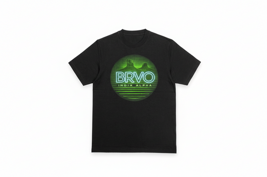 Black shirt with green and blue neon glow graphics.